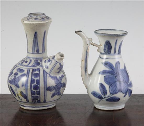 A Chinese Ming blue and white small ewer and a similar kendi, Wanli period, 11.5 and 13.5cm, glaze losses (2)